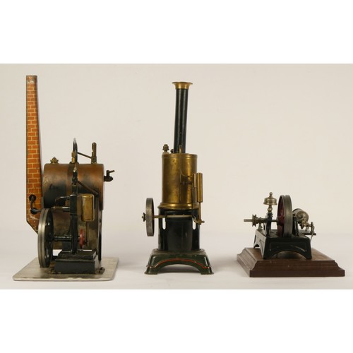 194 - A Doll et Cie vertical live steam boiler, c.1920-30, lacking burner, height 25cm, a vintage horizont... 