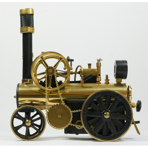 196 - A Wilesco D430 brass live steam traction engine, unfired, with instructions, 28cm.