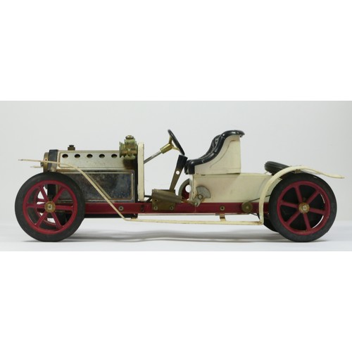 197 - A Mamod SA1 live steam white brass era motor car, lacking burner, 39cm.