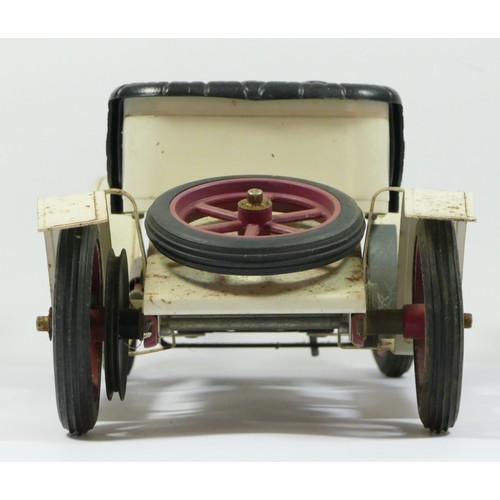 197 - A Mamod SA1 live steam white brass era motor car, lacking burner, 39cm.