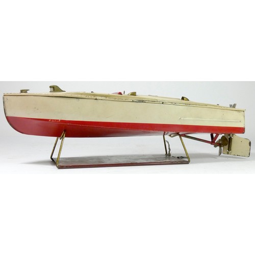 206 - A Lionel Craft tinplate boat, wind up, key and stand, 43cm long, together with a Golden Streak tinpl... 