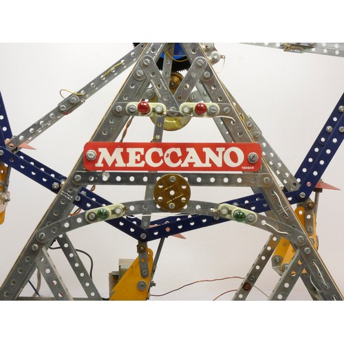 215 - A Meccano shop display, Ferris Wheel, illuminated, powered, on a wooden base, 50cm x 62cm x 38cm