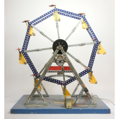 215 - A Meccano shop display, Ferris Wheel, illuminated, powered, on a wooden base, 50cm x 62cm x 38cm