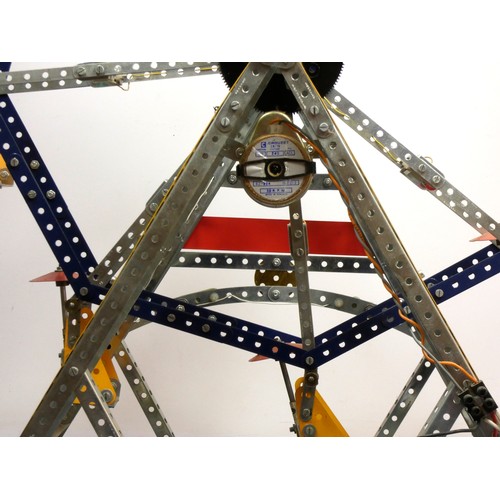 215 - A Meccano shop display, Ferris Wheel, illuminated, powered, on a wooden base, 50cm x 62cm x 38cm