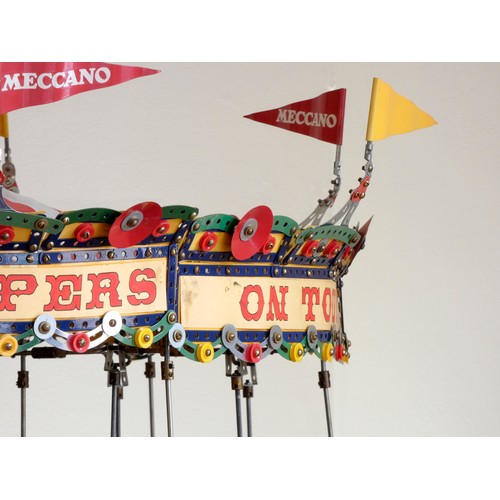 218 - A Meccano shop display, 24 horse carousel, balanced on an electric motor including lights (not funct... 