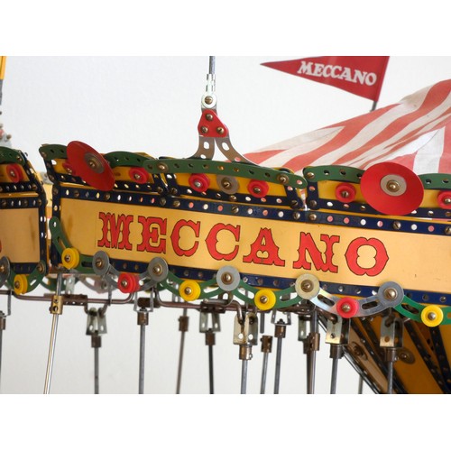 218 - A Meccano shop display, 24 horse carousel, balanced on an electric motor including lights (not funct... 