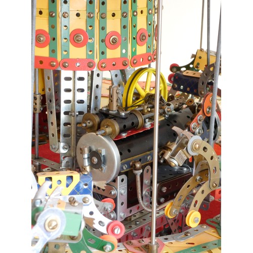 218 - A Meccano shop display, 24 horse carousel, balanced on an electric motor including lights (not funct... 