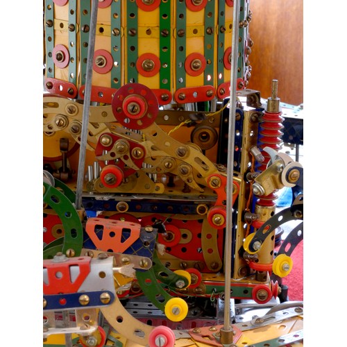 218 - A Meccano shop display, 24 horse carousel, balanced on an electric motor including lights (not funct... 