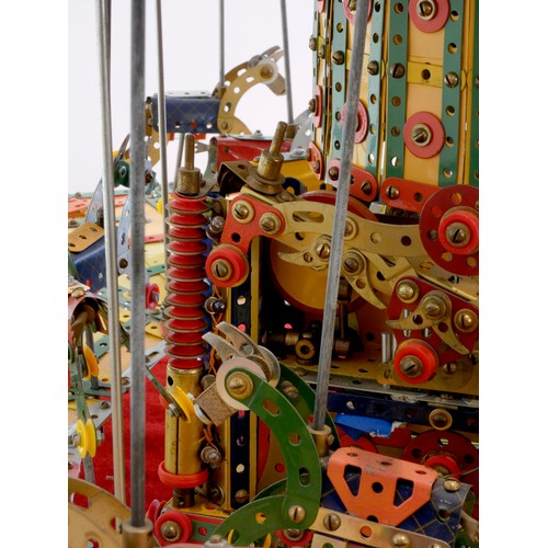 218 - A Meccano shop display, 24 horse carousel, balanced on an electric motor including lights (not funct... 