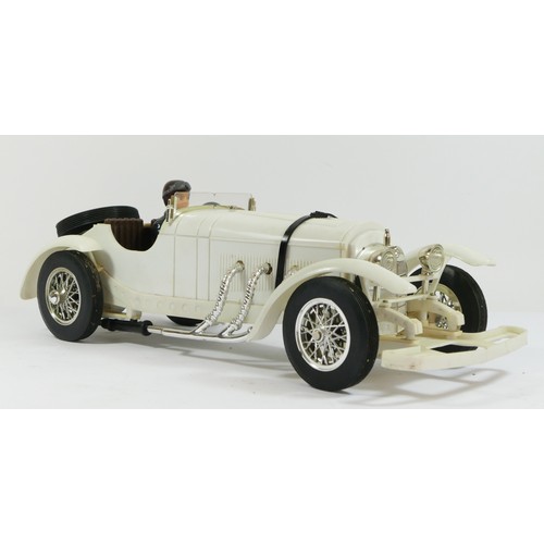 247 - An Einco radio controlled car, Mercedes 1931 open tourer complete with remote, decal stickers, manua... 