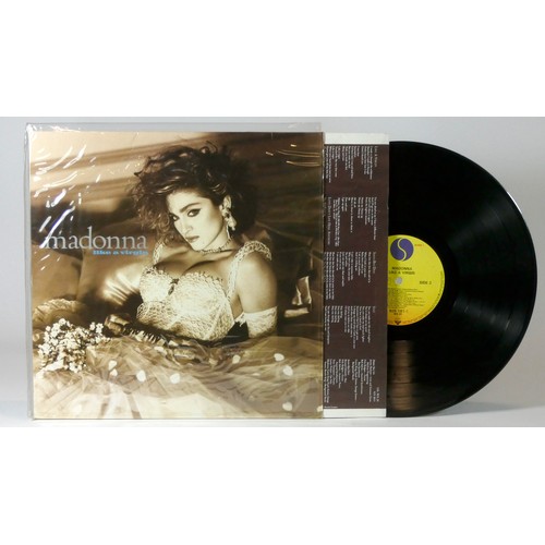 292 - Sixteen vinyl LPs, to include Madonna - Like A Virgin (925 181-1), Madonna - True Blue (925 441-1), ... 