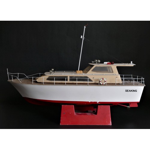 313 - Sea King, a radio controlled power boat with fibreglass hull and timber deck and superstructure, twi... 