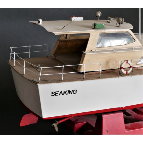 313 - Sea King, a radio controlled power boat with fibreglass hull and timber deck and superstructure, twi... 