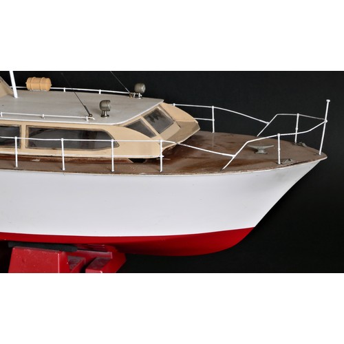 313 - Sea King, a radio controlled power boat with fibreglass hull and timber deck and superstructure, twi... 