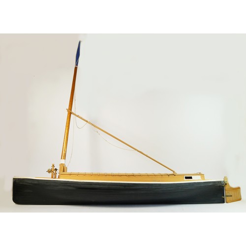 317 - A Norfolk Wherry model, scale 1:16, fibreglass hull, wooden topsides, incomplete, with 1985 blue pri... 