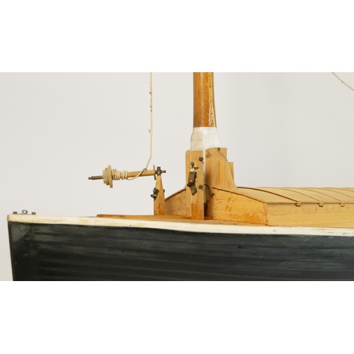 317 - A Norfolk Wherry model, scale 1:16, fibreglass hull, wooden topsides, incomplete, with 1985 blue pri... 