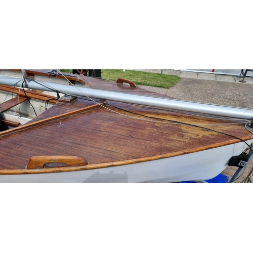 323 - An Enterprise sailing dinghy, serial number 310, mould 10, sail number K16581, 4 meter/two person, b... 