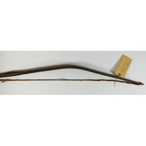 411 - A Canadian bow with cross hatched carved decoration, 148cm, with owners label 