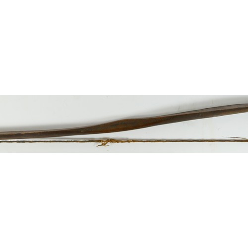 411 - A Canadian bow with cross hatched carved decoration, 148cm, with owners label 