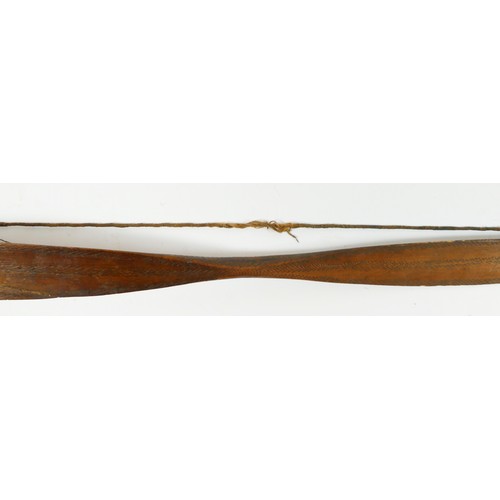 411 - A Canadian bow with cross hatched carved decoration, 148cm, with owners label 