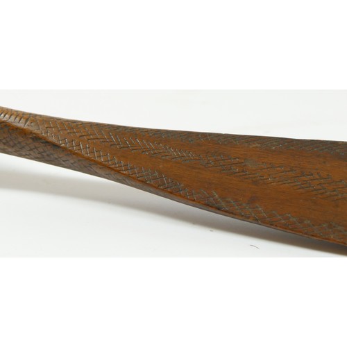 411 - A Canadian bow with cross hatched carved decoration, 148cm, with owners label 