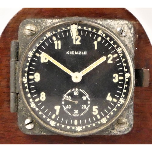 415 - A WWII German 8 day aircraft clock by Kienzle, black dial with luminous Arabic numerals and hands, s... 