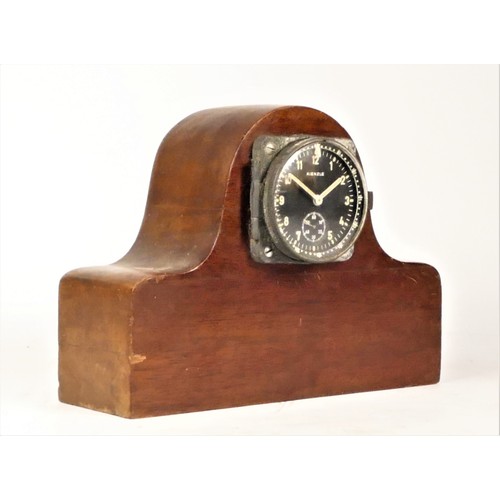 415 - A WWII German 8 day aircraft clock by Kienzle, black dial with luminous Arabic numerals and hands, s... 