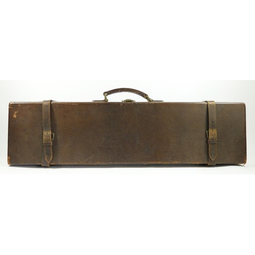 426 - A vintage leather and canvas shotgun case, initialed G.S.R. and a leather shotgun case (2).