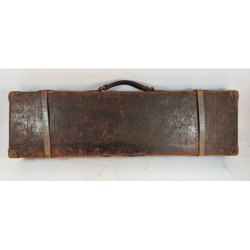 425 - A vintage leather bound, wood framed shogun case, initialed W.P.G. with a cleaning rod