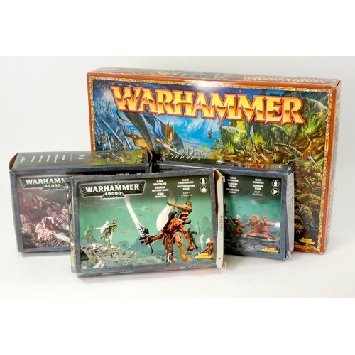 242 - Four boxed Warhammer model kits (unsure if complete), most sprues intact, to include Warhammer Islan... 