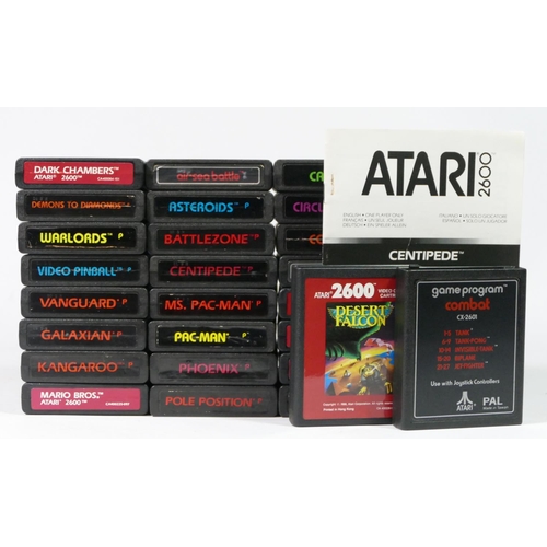 465 - Twenty Six Atari cartridges, to include Air-Sea Battle, Asteroids, Battlezone, Centipede (with manua... 