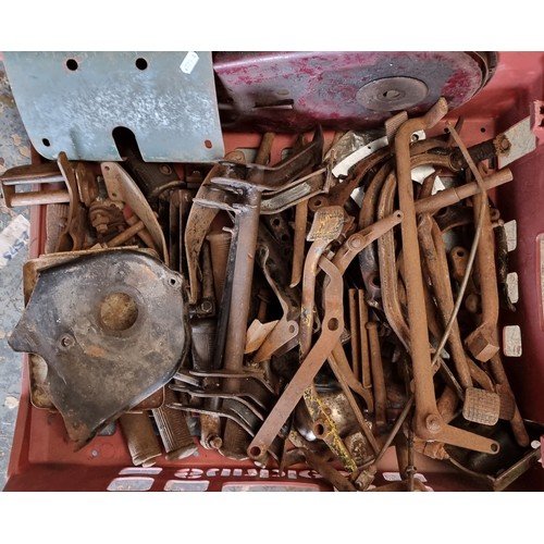 107 - A box of rear brake levers, prop stands and centre stands