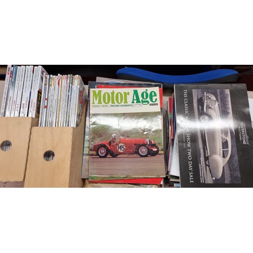 1 - A collection of motor car and motor cycle hardback books, to include Fangio, Pirelli Album, together... 