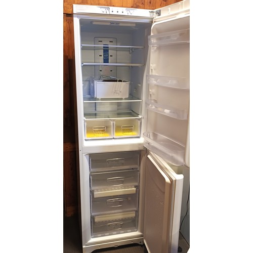 3 - An Indesit free standing fridge/freezer 200cm tall, 58cm wide, together with a Novia Scotia chest fr... 