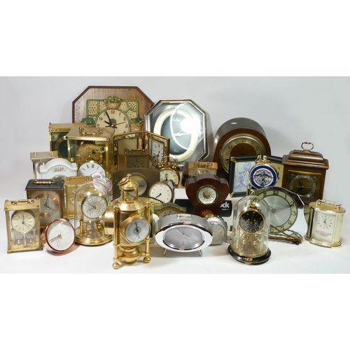 72 - A collection of mid 20th century clocks, to include wall clocks, lantern and anniversary clocks by S... 
