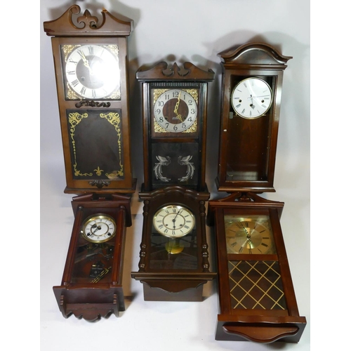 74 - A collection of seven Vienna style wall clocks, having manual wind 8 day and 30 day movements.