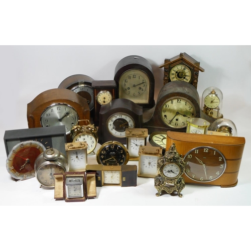 78 - A collection of mid 20th century clocks, to include a Smiths bakelite cased example, together with a... 