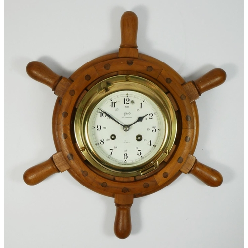 87 - A German 'Schatz Midi Mariner' brass bulkhead clock, having 8 day jewelled movement striking to bell... 
