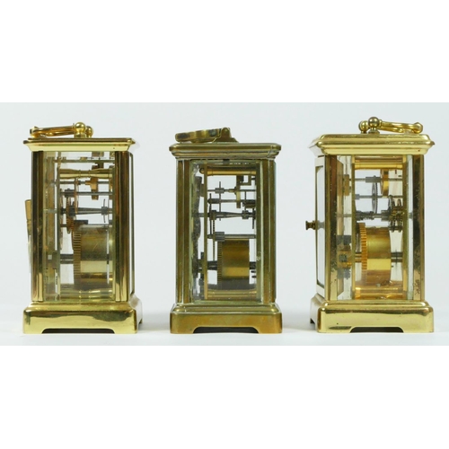 88 - Three brass cased carriage clocks, having enameled dials with roman numerals and 8 day movements. (3... 