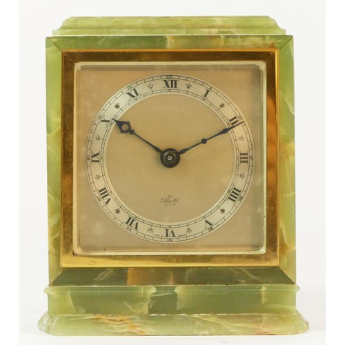 85 - An Elliott 8 day mantle clock, green veined onex case, silvered dial, brass bezel with Roman numeral... 