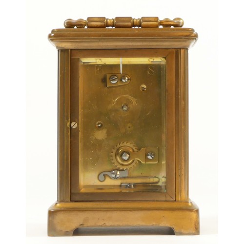 84 - An early 20th Century 8 day carriage clock, brass cased, with bevel edged glass panels, complete wit... 