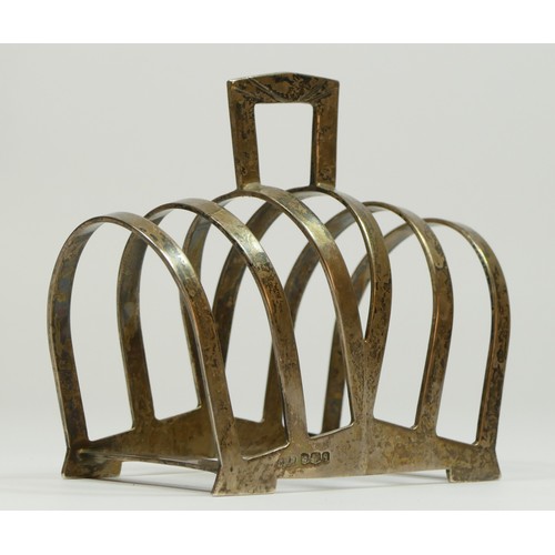 106 - An Art Deco silver four division toastrack, Sheffield 1933, 111gm, 10cm
