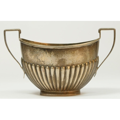 122 - A silver sugar bowl, Birmingham 1938, with half fluted decoration, 84gm