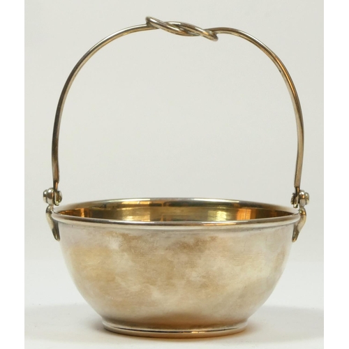 125 - A white metal swing handle sugar basket, bearing control marks 926 standard, 61gm