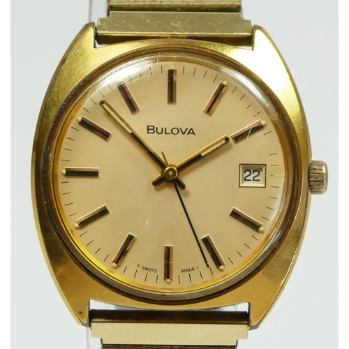 161 - Bulova, a gilt metal manual wind date gentleman's wristwatch, ref N4, 35 mm, expanding strap, togeth... 