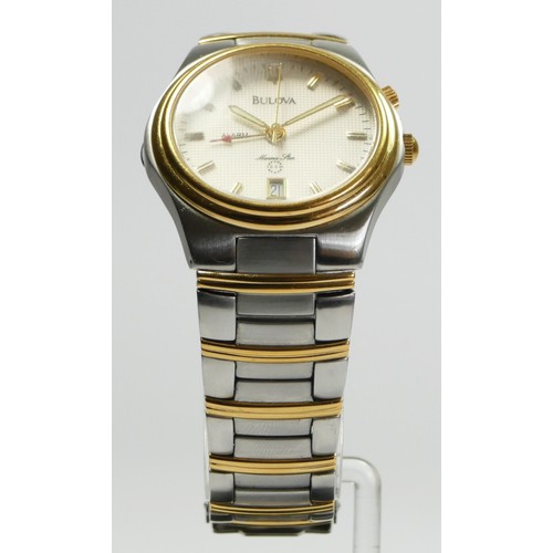 162 - Bulova Marine Star, a stainless steel and gilt metal alarm date quartz gentleman's wristwatch, 36mm,... 
