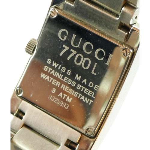 169 - Gucci, a stainless steel date quartz gentleman's wristwatch, ref. 7700L, serial number 0025993, case