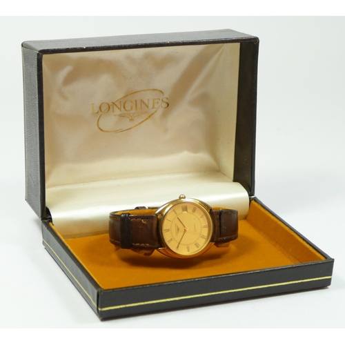 171 - Longines, a gilt metal date quartz gentleman's wristwatch, leather strap, 33mm, box.