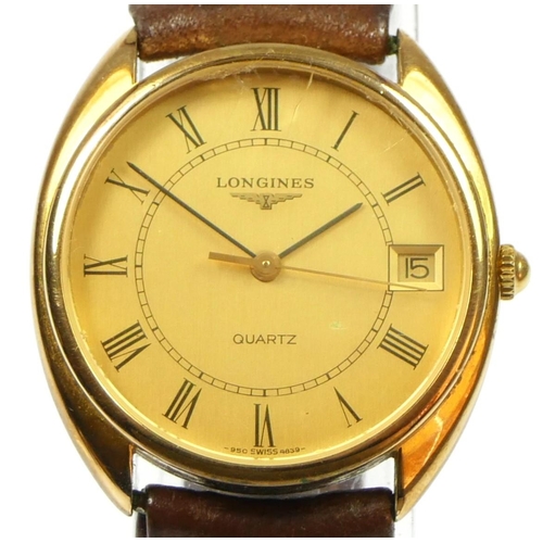 171 - Longines, a gilt metal date quartz gentleman's wristwatch, leather strap, 33mm, box.