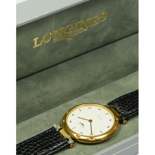 172 - Longines, a gilt metal quartz gentleman's wristwatch, leather strap, 30mm, box